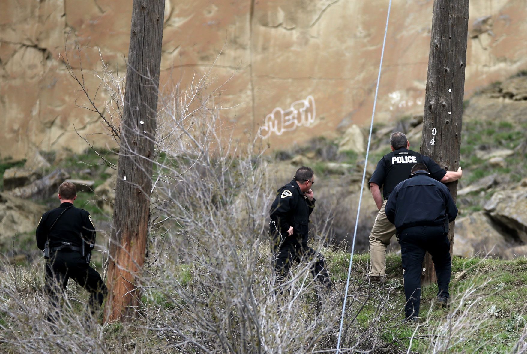 Law enforcement surround a man